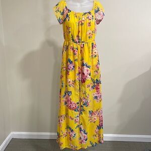 NWOT.  Toxik Romper Dress yellow floral. Size 12 L large